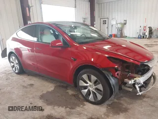 2022 Tesla Model Y Long Range z VIN 7SAYGAEE4NF309961, wystawiony jako IAAI lot #42434659 z przebiegiem 4 mil mil oraz . Historia ofert i sprzedaży dostępna na DreamBid. Obrazek 1.