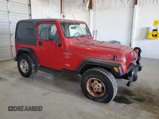 2000 Jeep Wrangler Sport with VIN 1J4FA49S9YP751596, listed as a Copart auction lot 52527315 with 132,514 mi miles and Clean Title. Bid and sale history available at carsss.com. Image 4.