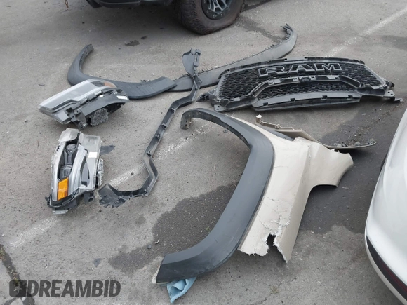 2022 Ram 1500 TRX with VIN 1C6SRFU92NN383774, listed as a IAAI auction lot 41788415 with 34,646 mi miles and . Bid and sale history available at DreamBid. Image 12.
