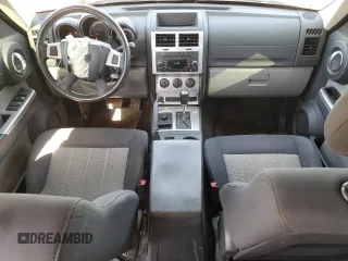 2010 Dodge Nitro SXT with VIN 1D4PU5GK1AW129356, listed as a Copart auction lot 53111155 with 158,818 mi miles and Salvage Title. Bid and sale history available at DreamBid. Image 8.