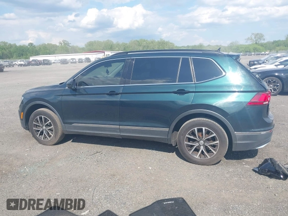 2018 Volkswagen Tiguan SEL z VIN 3VV2B7AX0JM047200, wystawiony jako IAAI lot #42221523 z przebiegiem 108 753 mil mil oraz . Historia ofert i sprzedaży dostępna na DreamBid. Obrazek 14.