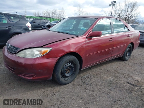 2004 Toyota Camry LE with VIN 4T1BE32K84U307551, listed as a IAAI auction lot 42054571 with 115,513 mi miles. Bid and sale history available at carsss.com. Image 2.