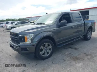 2019 Ford F-150 XL with VIN 1FTEW1CP6KFA29974, listed as a IAAI auction lot 42700306 with 114,333 mi miles and . Bid and sale history available at DreamBid. Image 2.