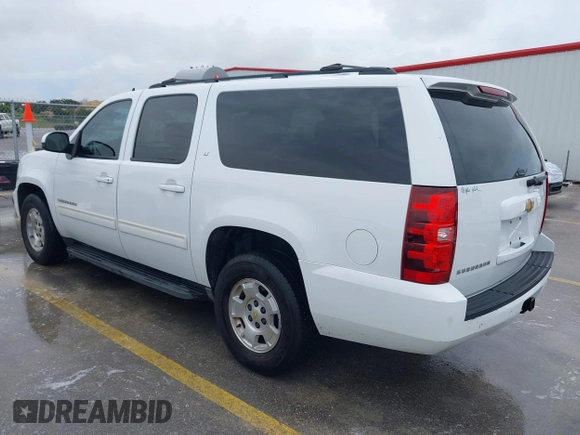 2012 Chevrolet Suburban LT with VIN 1GNSCJE00CR165813, listed as a IAAI auction lot 42494042 with 205,998 mi miles and . Bid and sale history available at DreamBid. Image 3.