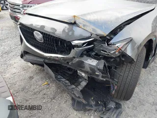 2024 Mazda CX-90 Preferred Plus with VIN JM3KKCHD4R1153782, listed as a IAAI auction lot 41951371 with 39,314 mi miles and . Bid and sale history available at DreamBid. Image 20.