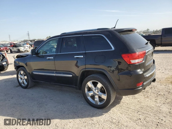 2012 Jeep Grand Cherokee Overland with VIN 1C4RJECT5CC362819, listed as a Copart auction lot 48130085 with 107,350 mi miles and Salvage Title. Bid and sale history available at carsss.com. Image 2.