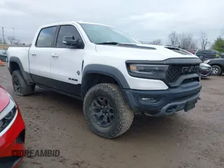 2021 Ram 1500 TRX with VIN 1C6SRFU97MN905720, listed as a IAAI auction lot 41031423 with 32,559 mi miles. Bid and sale history available at carsss.com. Image 1.