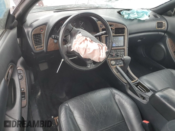 1996 Toyota Celica GT z VIN JT5FG02T3T0031613, wystawiony jako Copart lot #58410225 z przebiegiem 124 899 mil mil oraz Szkoda całkowita • Salvage title. Historia ofert i sprzedaży dostępna na DreamBid. Obrazek 8.