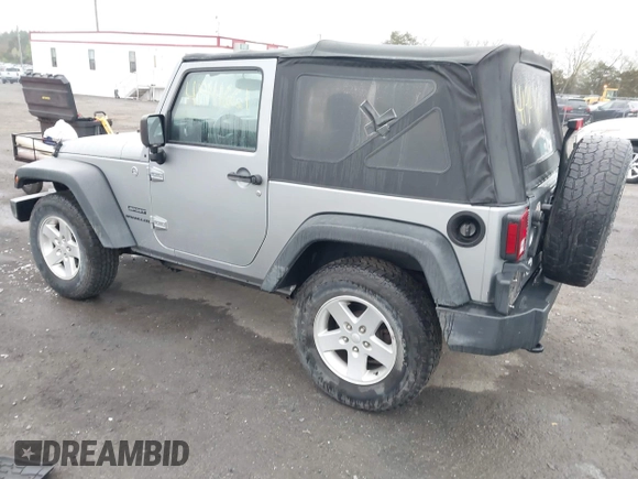 2015 Jeep Wrangler Sport with VIN 1C4AJWAG6FL501160, listed as a IAAI auction lot 41941661 with 134,842 mi miles. Bid and sale history available at carsss.com. Image 3.