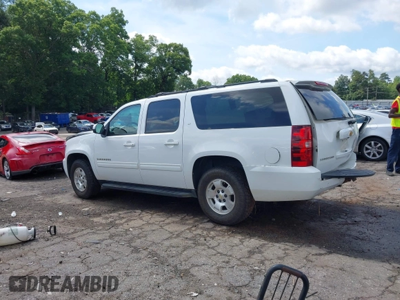 2014 Chevrolet Suburban LT with VIN 1GNSCJE07ER211222, listed as a IAAI auction lot 42428084 with 214,712 mi miles and . Bid and sale history available at DreamBid. Image 14.