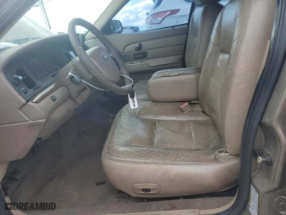 2005 Ford Crown Victoria LX with VIN 2FAFP74W95X147431, listed as a Copart auction lot 73487374 with 203,107 mi miles and Non Repairable. Bid and sale history available at carsss.com. Image 7.