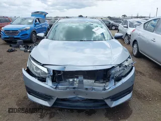 2018 Honda Civic LX with VIN 2HGFC2F50JH500559, listed as a IAAI auction lot 42040271 with 82,026 mi miles and . Bid and sale history available at DreamBid. Image 12.