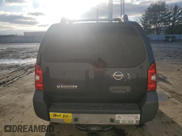 2013 Nissan Xterra S with VIN 5N1AN0NW4DN819116, listed as a Copart auction lot 43557285 with 140,694 mi miles and Salvage title. Bid and sale history available at DreamBid. Image 6.