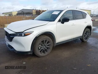 2024 Mazda CX-5 2.5 Carbon Turbo with VIN JM3KFBAY5R0425970, listed as a IAAI auction lot 41187507 with 8,851 mi miles. Bid and sale history available at carsss.com. Image 2.