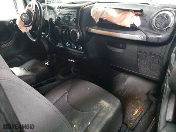 2015 Jeep Wrangler Sport with VIN 1C4AJWAG4FL520242, listed as a Copart auction lot 44134365 with 118,424 mi miles and Salvage Title. Bid and sale history available at carsss.com. Image 8.