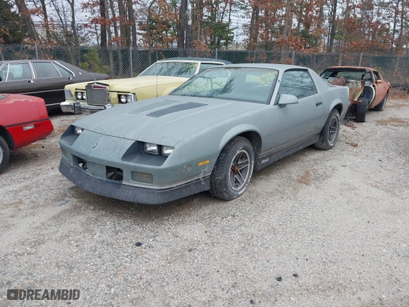1985 Chevrolet Camaro Z28 Sport with VIN 1G1FP87HXFL442512, listed as a IAAI auction lot 41387610 with 136,000 mi miles. Bid and sale history available at carsss.com. Image 2.