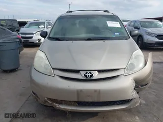 2010 Toyota Sienna CE with VIN 5TDKK4CC9AS311702, listed as a IAAI auction lot 41586415 with 206,453 mi miles. Bid and sale history available at carsss.com. Image 6.