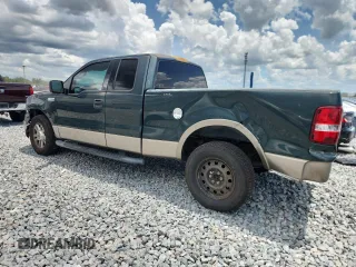 2004 Ford F-150 XL with VIN 1FTPX12564NA87792, listed as a Copart auction lot 60489655 with 396,269 mi miles and Salvage title. Bid and sale history available at DreamBid. Image 2.