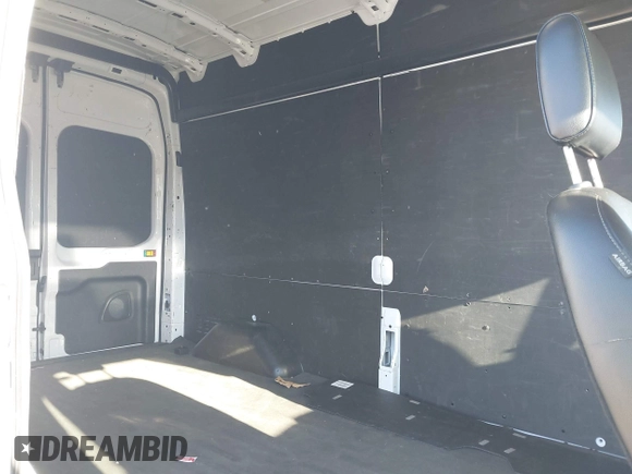 2023 Ford Transit Cargo with VIN 1FTBR1X84PKB02027, listed as a IAAI auction lot 42062820 with 79,813 mi miles and . Bid and sale history available at DreamBid. Image 8.