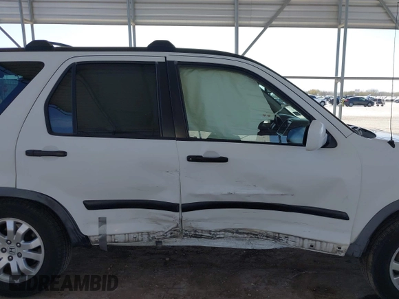 2005 Honda CR-V EX z VIN JHLRD78845C025264, wystawiony jako IAAI lot #41752341 z przebiegiem 196 753 mil mil oraz . Historia ofert i sprzedaży dostępna na DreamBid. Obrazek 14.