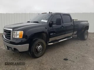 2007 GMC Sierra 3500HD DRW SLE2 z VIN 1GTJK33687F566382, wystawiony jako Copart lot #85123944 z przebiegiem 185 742 mil mil oraz Tytuł czysty. Historia ofert i sprzedaży dostępna na DreamBid. Obrazek 1.