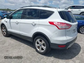 2013 Ford Escape SE with VIN 1FMCU0GX0DUC79223, listed as a IAAI auction lot 42077240 with 158,141 mi miles and . Bid and sale history available at DreamBid. Image 3.