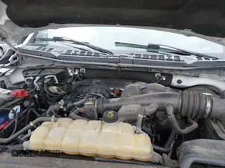 2018 Ford F-150 XL with VIN 1FTMF1CBXJKC83791, listed as a IAAI auction lot 41796119 with 196,611 mi miles. Bid and sale history available at carsss.com. Image 10.
