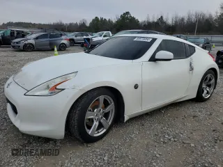 2009 Nissan 370Z z VIN JN1AZ44E99M406939, wystawiony jako Copart lot #85973054 z przebiegiem Nie podano mil oraz Szkoda całkowita • Salvage title. Historia ofert i sprzedaży dostępna na DreamBid. Obrazek 1.