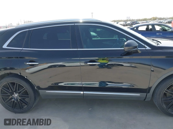 2016 Lincoln MKX Premiere with VIN 2LMTJ6JR7GBL75287, listed as a IAAI auction lot 41697039 with 85,943 mi miles. Bid and sale history available at carsss.com. Image 14.