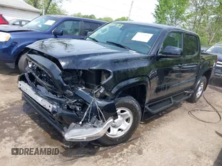 2022 Toyota Tacoma SR with VIN 3TYCZ5AN0NT074683, listed as a IAAI auction lot 42117875 with 51,112 mi miles and . Bid and sale history available at DreamBid. Image 2.