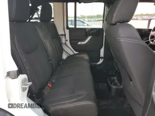 2014 Jeep Wrangler Unlimited Sahara z VIN 1C4BJWEG9EL102336, wystawiony jako Copart lot #55391335 z przebiegiem Nie podano mil oraz Szkoda całkowita • Salvage title. Historia ofert i sprzedaży dostępna na DreamBid. Obrazek 11.