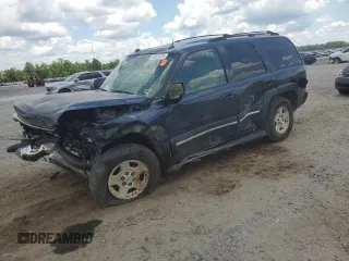 2004 Chevrolet Tahoe LT with VIN 1GNEC13Z64R273241, listed as a Copart auction lot 63001225 with 221,706 mi miles and Salvage title. Bid and sale history available at DreamBid. Image 1.