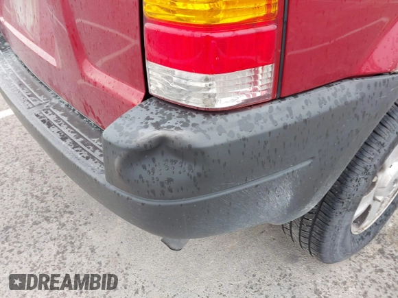 2003 Ford Escape XLT Popular 2 with VIN 1FMYU93103KA03842, listed as a IAAI auction lot 42517607 with 131,733 mi miles and . Bid and sale history available at DreamBid. Image 14.