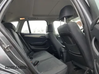 2014 BMW X1 xDrive28i z VIN WBAVL1C5XEVY22872, wystawiony jako Copart lot #54170135 z przebiegiem 93 214 mil mil oraz Czysty tytuł • Clean title. Historia ofert i sprzedaży dostępna na DreamBid. Obrazek 10.