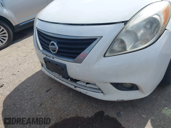 2012 Nissan Versa SV with VIN 3N1CN7AP6CL915352, listed as a IAAI auction lot 42720220 with 187,005 mi miles and . Bid and sale history available at DreamBid. Image 12.