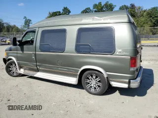 2002 Ford Econoline Cargo with VIN 1FDRE14W62HB15506, listed as a Copart auction lot 74686494 with 253,296 mi miles and Salvage Title. Bid and sale history available at DreamBid. Image 2.