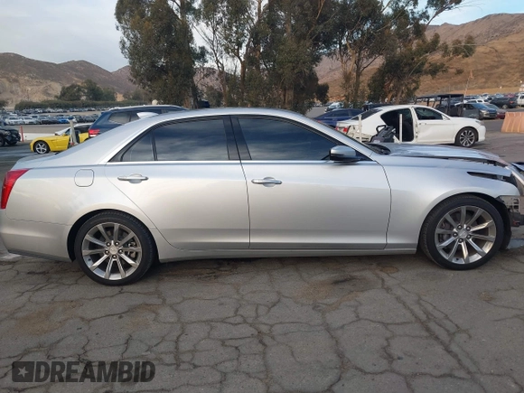 2019 Cadillac CTS Luxury RWD with VIN 1G6AR5SX8K0135380, listed as a IAAI auction lot 41115382 with 65,199 mi miles and . Bid and sale history available at DreamBid. Image 14.