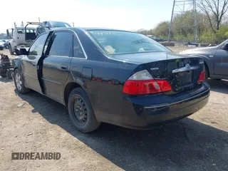 2004 Toyota Avalon XL with VIN 4T1BF28BX4U368060, listed as a IAAI auction lot 42012961 with 210,986 mi miles and . Bid and sale history available at carsss.com. Image 3.