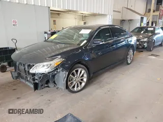 2014 Toyota Avalon Limited with VIN 4T1BK1EB1EU128987, listed as a IAAI auction lot 42034677 with 104,153 mi miles and . Bid and sale history available at DreamBid. Image 18.