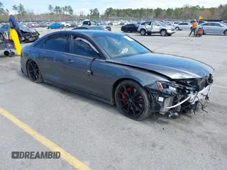 2022 Audi S8 with VIN WAULSAF83NN001905, listed as a IAAI auction lot 41813861 with 18,461 mi miles and . Bid and sale history available at DreamBid. Image 1.