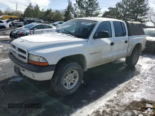 2002 Dodge Dakota Sport with VIN 1B7HG38NX2S637243, listed as a Copart auction lot 45389675 with 173,333 mi miles and Salvage Title. Bid and sale history available at carsss.com. Image 1.