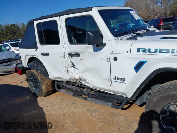 2023 Jeep Wrangler Rubicon with VIN 1C4JJXR64PW586369, listed as a IAAI auction lot 41587561 with 16,038 mi miles and . Bid and sale history available at DreamBid. Image 14.