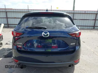 2018 Mazda CX-5 Touring with VIN JM3KFACM3J1370129, listed as a IAAI auction lot 41829027 with 71,305 mi miles. Bid and sale history available at carsss.com. Image 16.