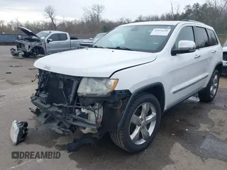 2013 Jeep Grand Cherokee Overland with VIN 1C4RJECG5DC648593, listed as a IAAI auction lot 41576630 with 187,098 mi miles. Bid and sale history available at carsss.com. Image 2.