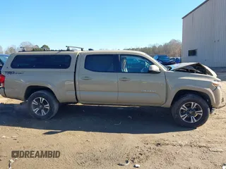 2017 Toyota Tacoma SR5 with VIN 3TMBZ5DN8HM009538, listed as a IAAI auction lot 41288551 with 84,551 mi miles and . Bid and sale history available at DreamBid. Image 13.