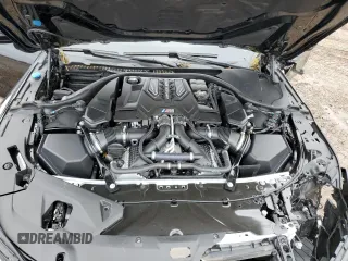 2020 BMW M8 z VIN WBSAE0C0XLCD01469, wystawiony jako Copart lot #47221453 z przebiegiem Nie podano mil oraz . Historia ofert i sprzedaży dostępna na DreamBid. Obrazek 12.