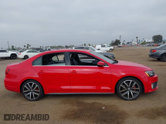 2014 Volkswagen Jetta GLI with VIN 3VW4T7AJ2EM246347, listed as a IAAI auction lot 42553341 with 140,793 mi miles and . Bid and sale history available at DreamBid. Image 13.