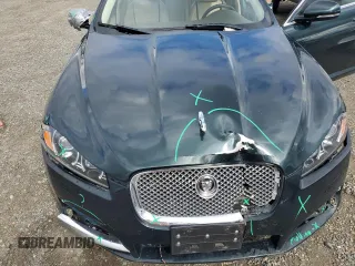 2012 Jaguar XF Portfolio with VIN SAJWA0HB4CLS49225, listed as a Copart auction lot 48070445 with 61,059 mi miles and Salvage Title. Bid and sale history available at carsss.com. Image 11.