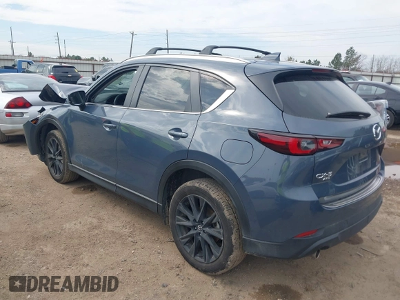 2023 Mazda CX-5 S Carbon Edition z VIN JM3KFBCM6P0288402, wystawiony jako IAAI lot #41682386 z przebiegiem 30 482 mil mil oraz . Historia ofert i sprzedaży dostępna na DreamBid. Obrazek 3.