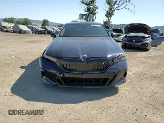 2024 BMW i5 eDrive40 with VIN WBY33FK03RCS14771, listed as a Copart auction lot 62393255 with 25,192 mi miles and Salvage title. Bid and sale history available at DreamBid. Image 13.